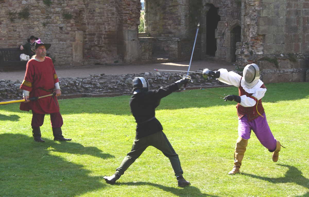 Fencers and a marshal at the Raglan castle